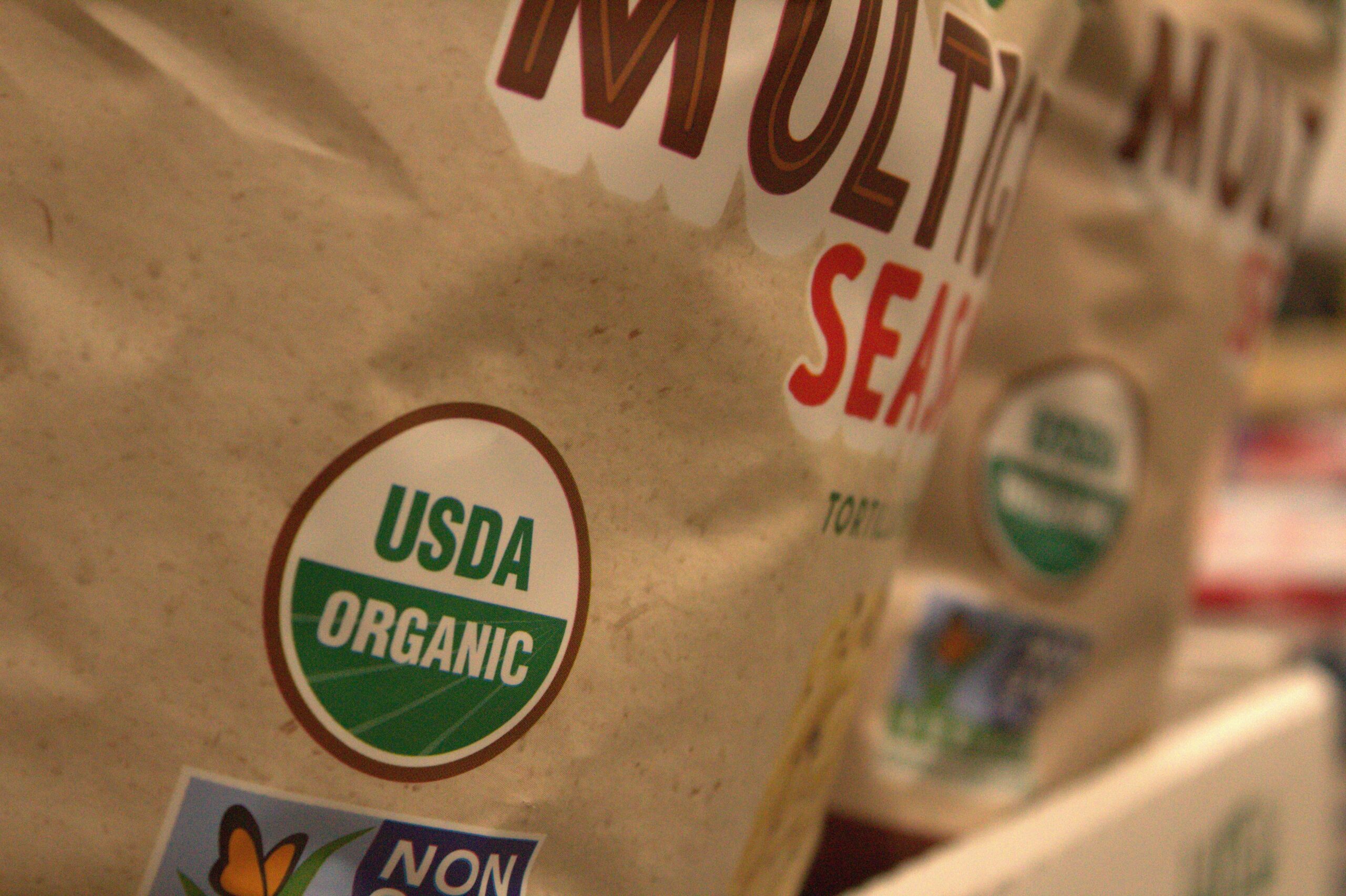 Close-up of labels showing USDA-certified organic cat food